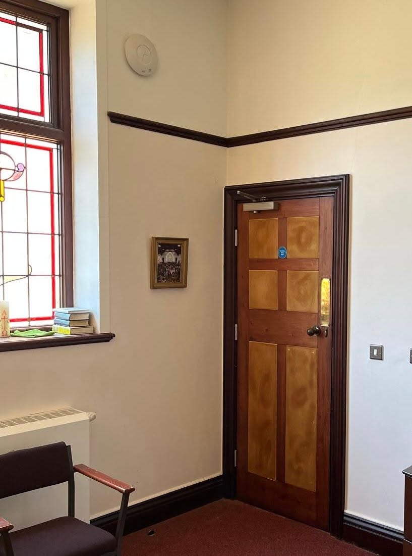 Timber panelled internal fire door installation with overhead closer, Dorset